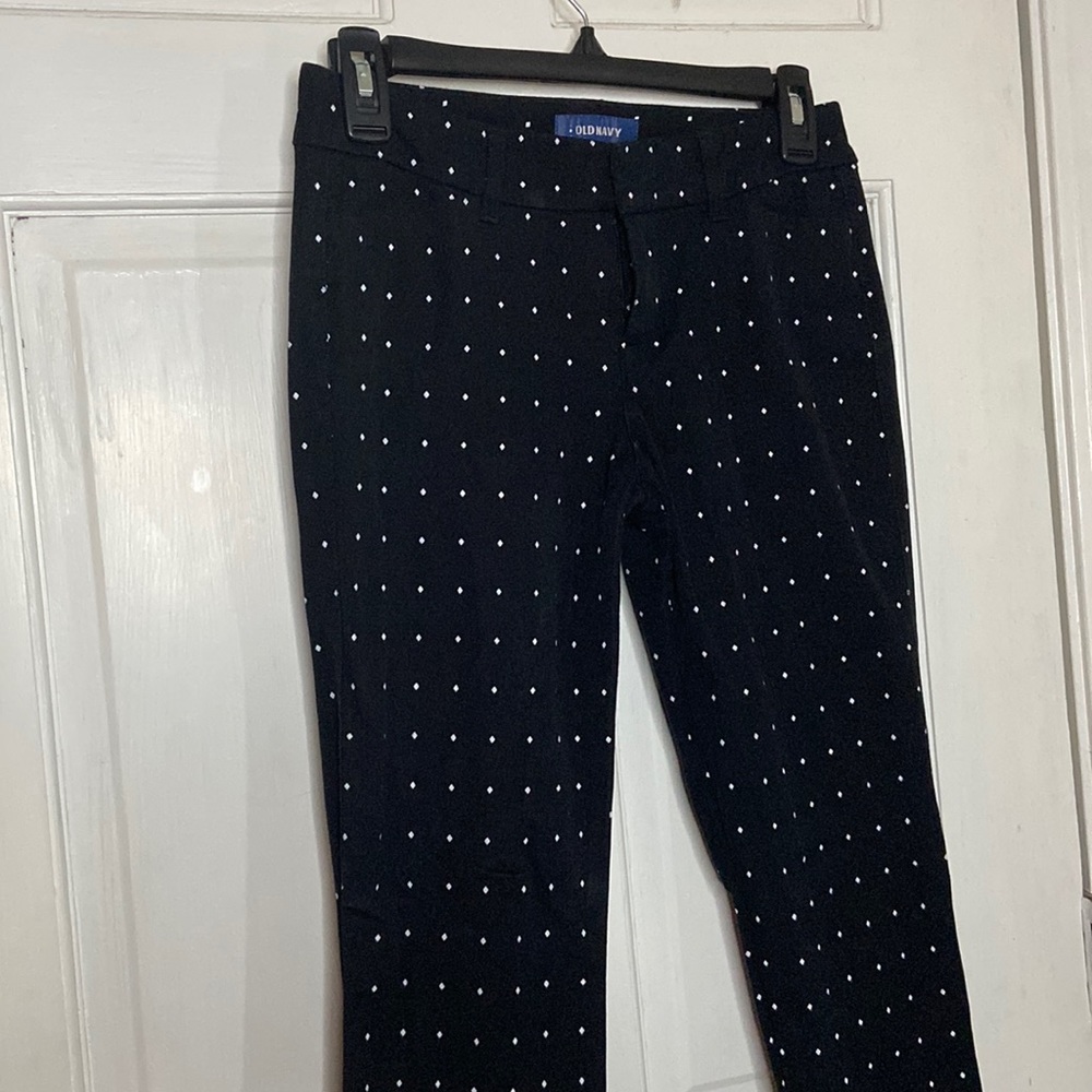 Black with white dots dress pants . Women size 0